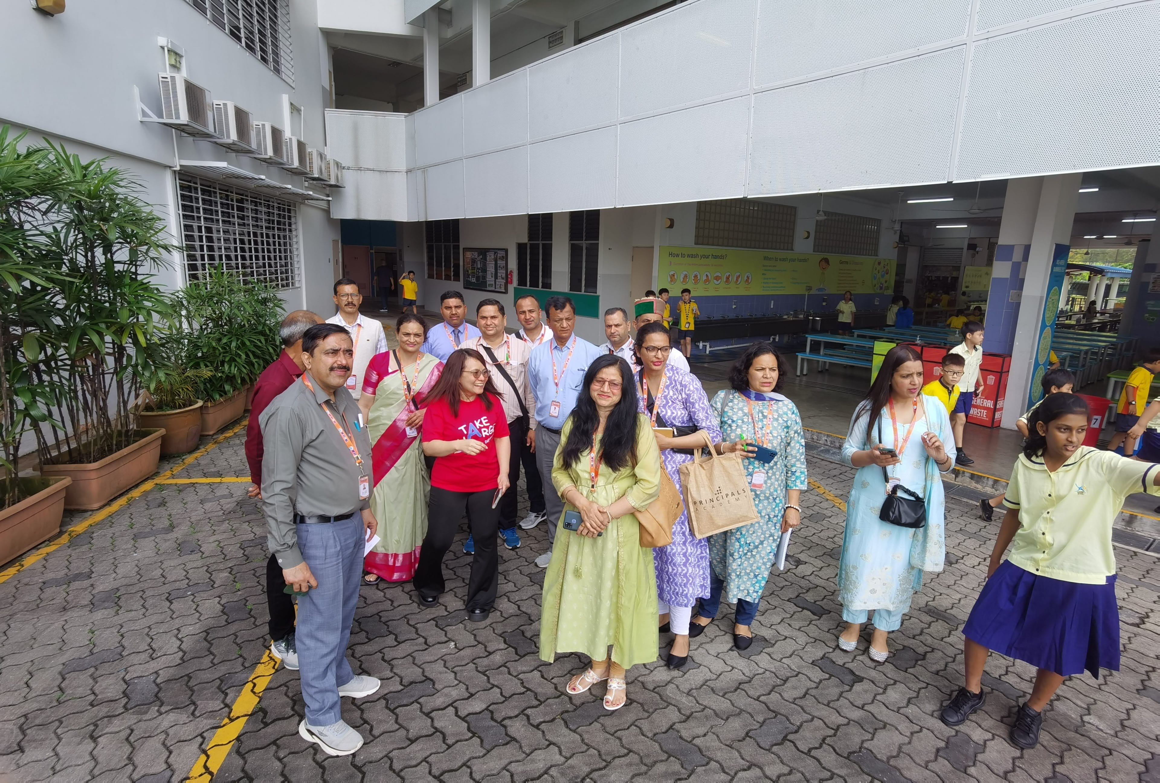 Students and staff leading our guests around the school for a tour